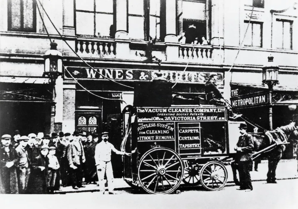 Booths Vacuum Carpet Cleaner in action 1903